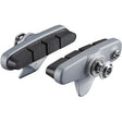 Пакни SHIMANO BR-R7000 R55C4 КОМПЛЕТ ЗА КОЧНИЦИ СО КАРТРИЏ (ПАР/СРЕБРЕНА) Y8ZJ98010 